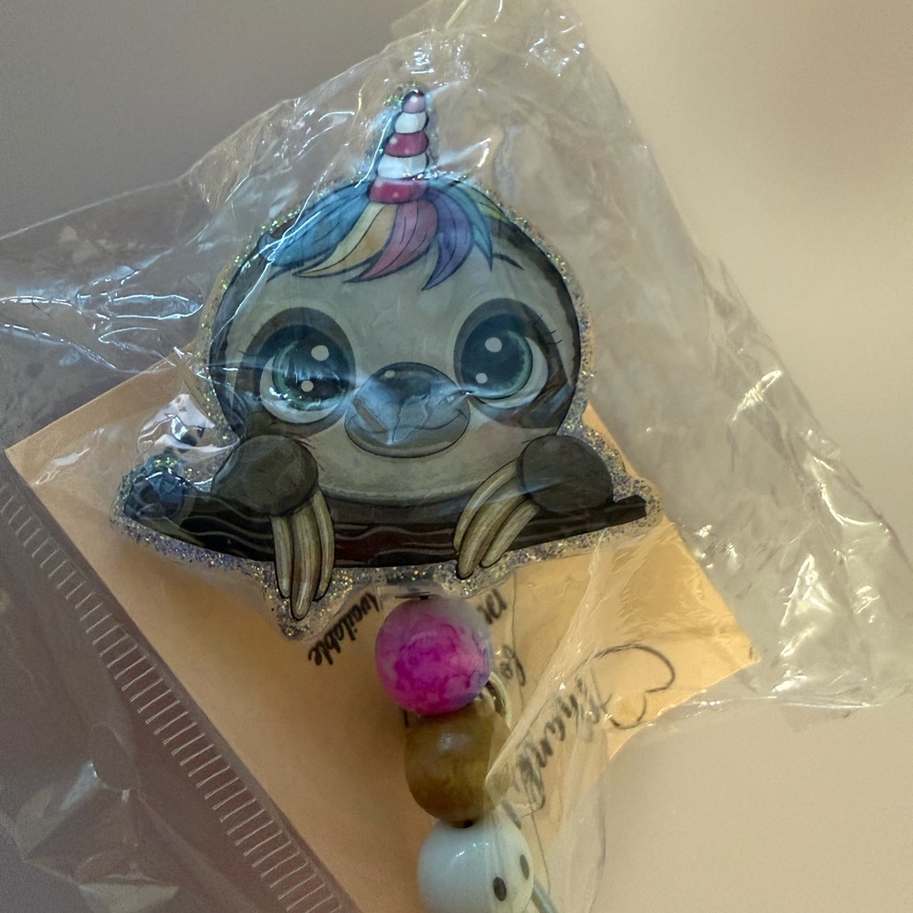 Badge‎ Reel Sloth